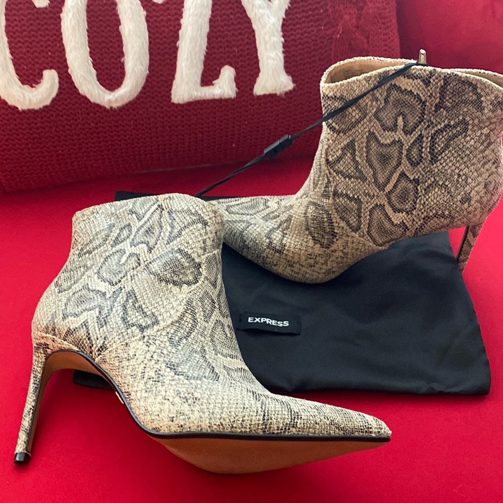 Brand new 4 inch Express ankle snake boots.